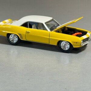 Classic Yellow and White Toy Car